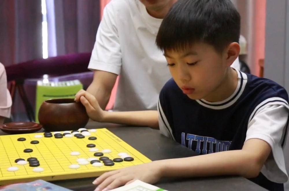 刘玮 | 棋韵润童心，温情满酒都——记录国手走访棋童家庭的温暖瞬间
